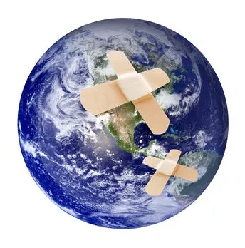 A globe patched with bandages, symbolizing a world of overlapping crises
